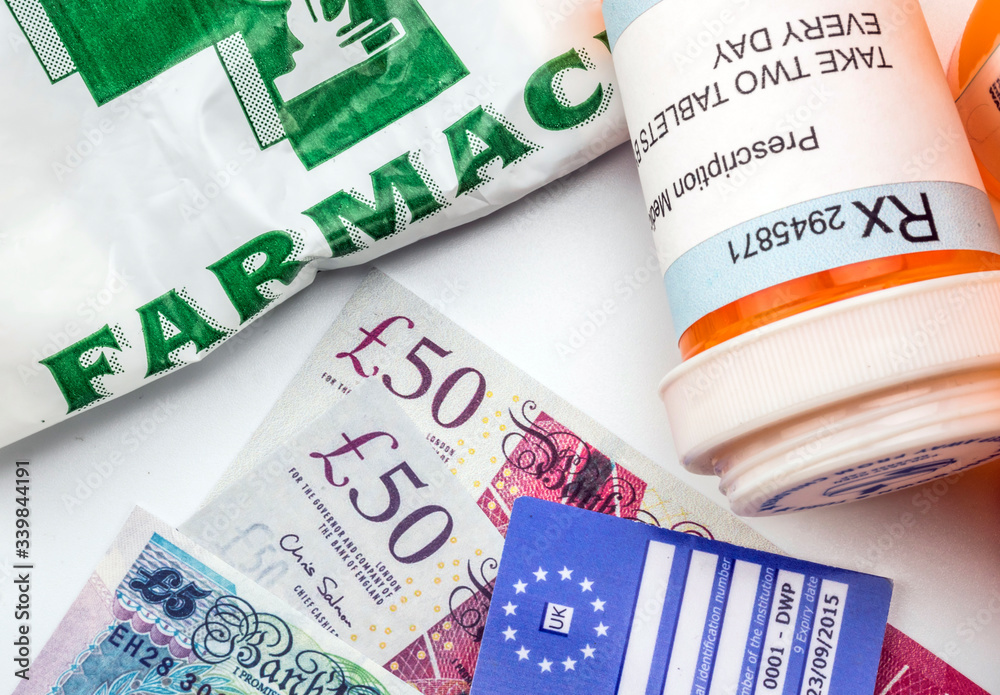 Obraz premium European health insurance card along with several capsules, concept of medical increase in the crisis of the brexit, conceptual image
