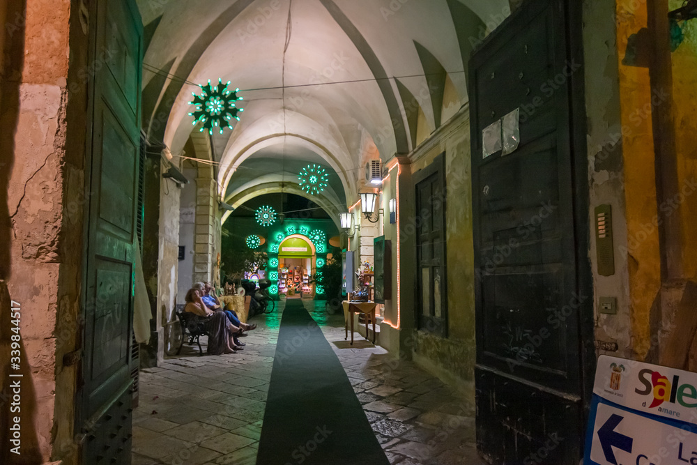 Fototapeta premium Night view of a street in the historic center of Lecce in Puglia, Italy..
