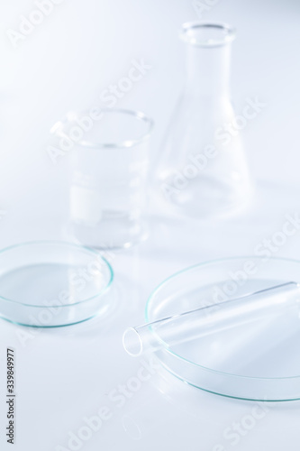 lab equipment beaker dropper petri on white background
