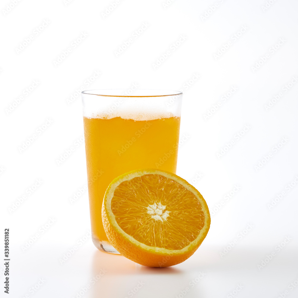 Orange juice and slices of orange Orange juice and slices of orange