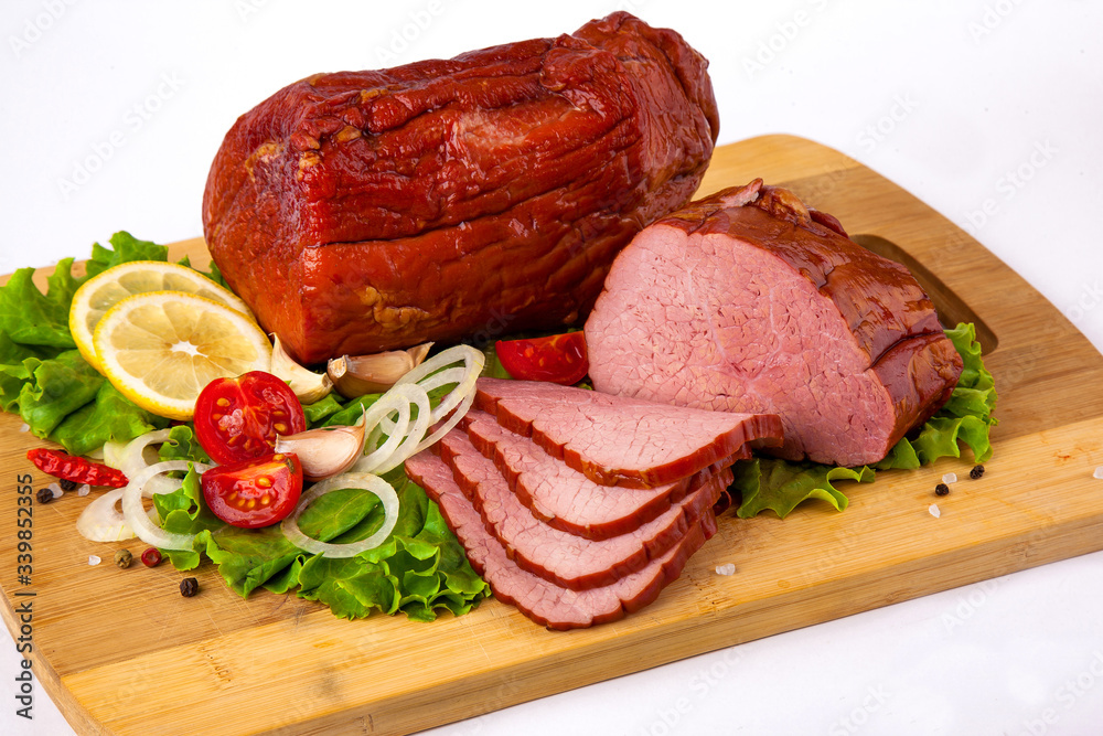 
food smoked meat with greens and vegetables white background