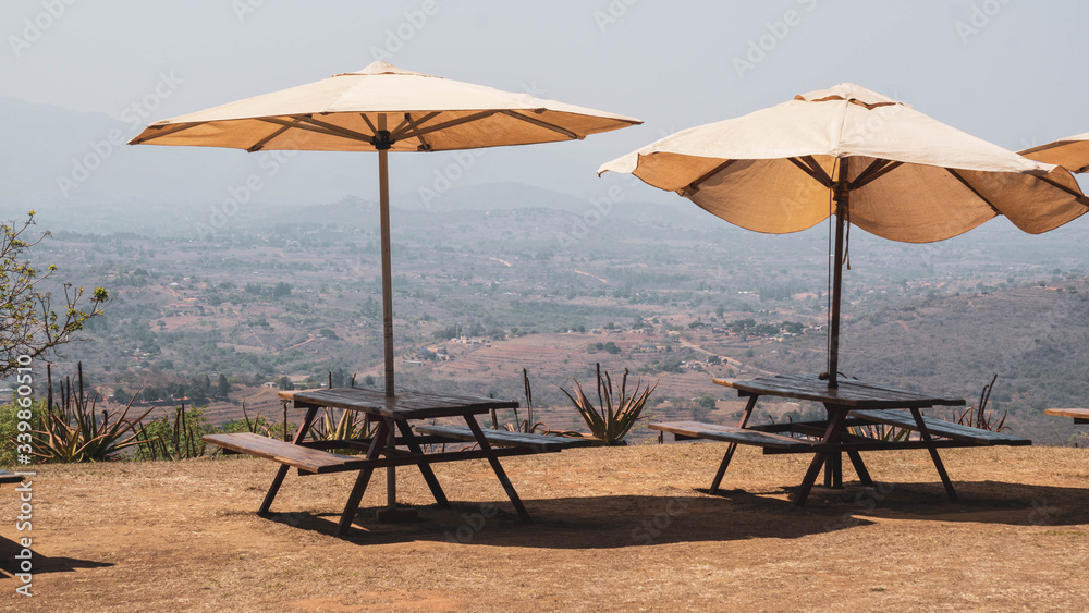 tables and umbrellas with lovely view in eSwatini