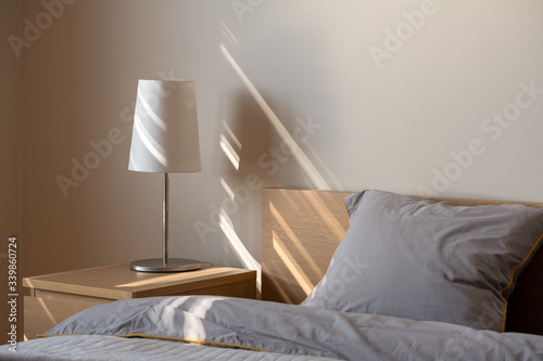 Photos Simple lamp on nightstand