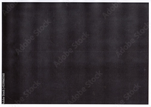 Print to test black toner , Black paper texture background.