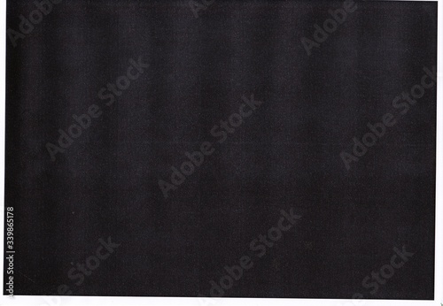 Print to test black toner , Black paper texture background.