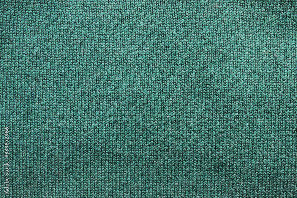 Felt dark green soft rough textile material background texture