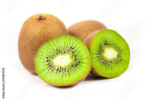 Close up of kiwi fruit and slice kiwi isolated on white background