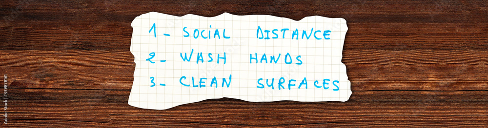 Coronavirus COVID-19 health safety guidelines. tear paper with rules, practice social distancing, wash hands, clean surfaces, hand washing, stay home. Coronavirus COVID-19 health safety guidelines. tear paper with rules, practice social distancing, wash hands, clean surfaces, hand washing, stay home.