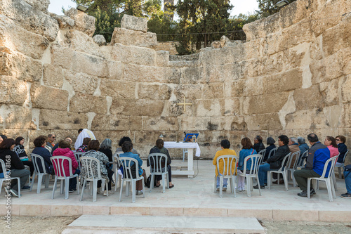 The priest makes a collective prayer on the ruins of the Byzantine church complex on the territory of Emmaus Nicopolis photo