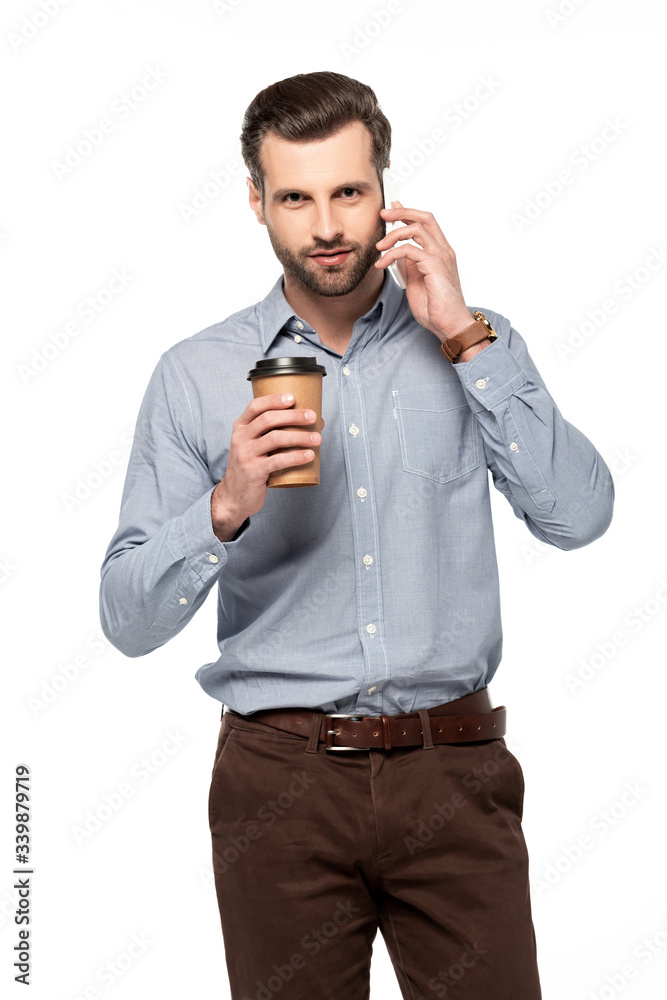 handsome man holding coffee to go and talking on smartphone isolated on white handsome man holding coffee to go and talking on smartphone isolated on white