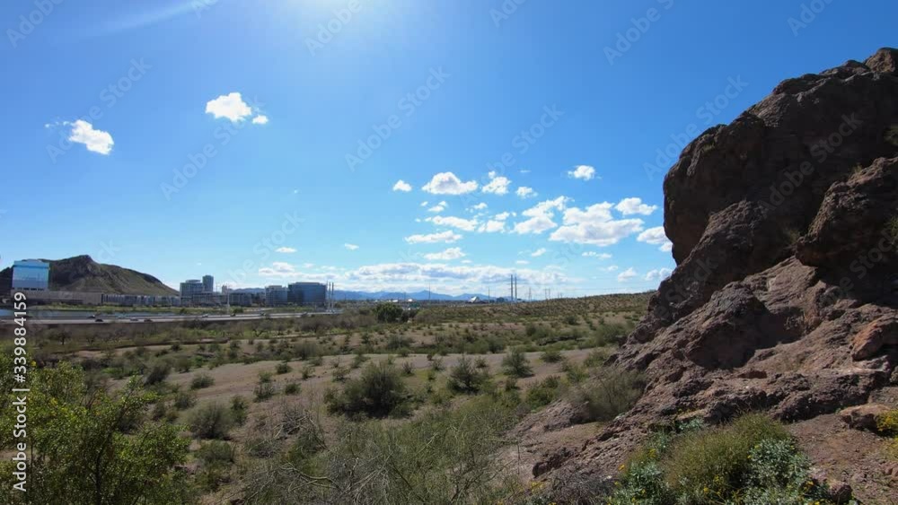 Time-Lapse from North cactus hiking trail of a view of Tempe Town Lake and the traffic on the Loop 202. Time-Lapse from North cactus hiking trail of a view of Tempe Town Lake and the traffic on the Loop 202.