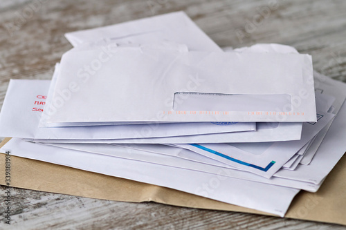 A stack of professional or invoice letters