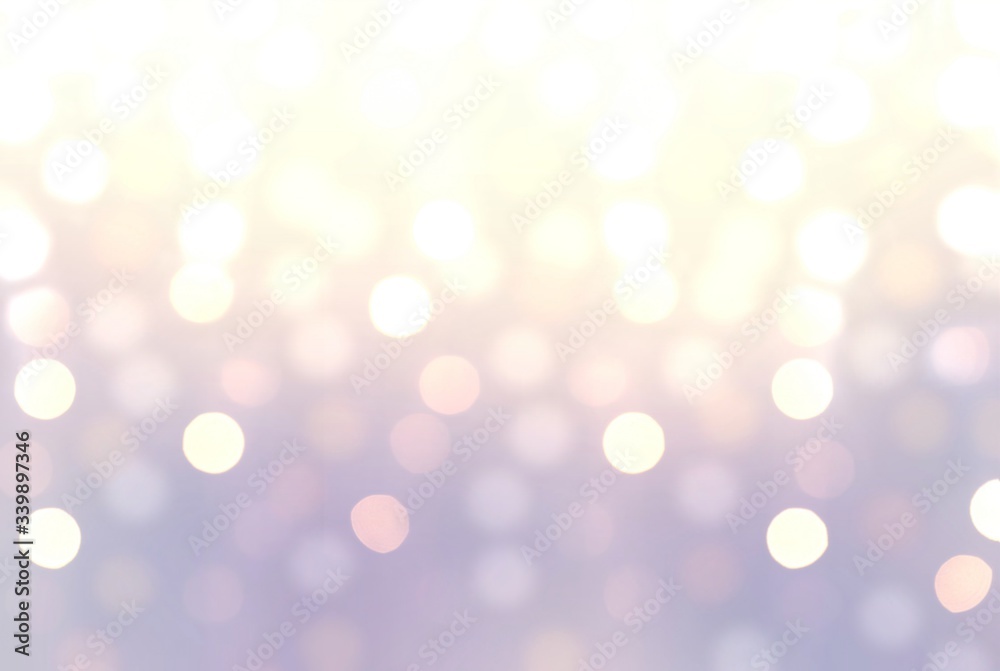 Sparkles close up on lilac iridescent blur backdrop. Glitter texture.