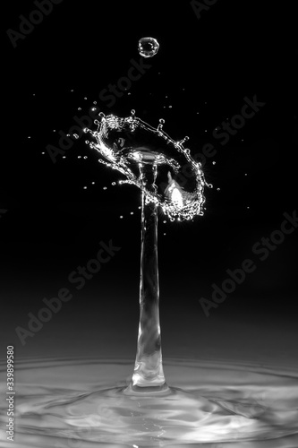 water drop falling on black background