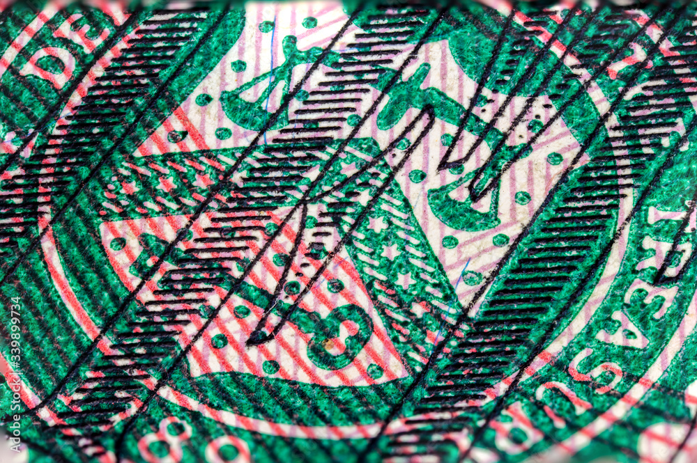Extreme macro photography of a 50 US dollar banknote. Ultra close up of a fifty American dollar note. US dollar is the world currency.  The green seal on the front of the note 