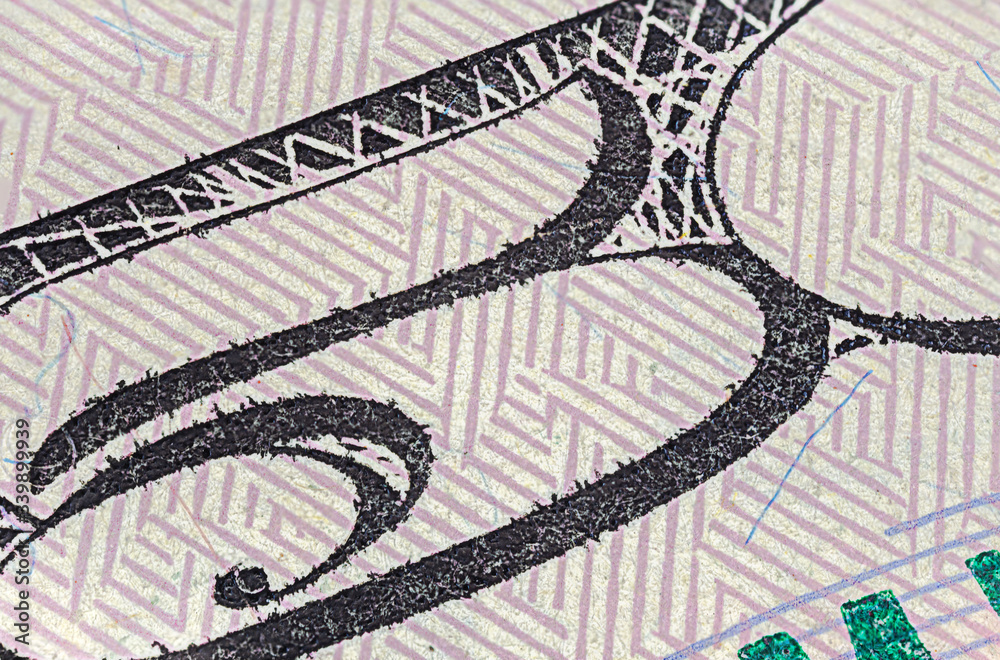 Extreme macro photography of a 50 US dollar banknote. Ultra close up of a fifty American dollar note. US dollar is the world currency. The Intaglio printed fifty on the front of the note. Extreme macro photography of a 50 US dollar banknote. Ultra close up of a fifty American dollar note. US dollar is the world currency. The Intaglio printed fifty on the front of the note.