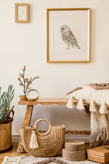 Stylish composition of living room interior with mock up frame, wooden bench, pillow, plaid, woman bag, books, cacti, macrame, plant, decortaion and elegant personal accessories in modern home decor.