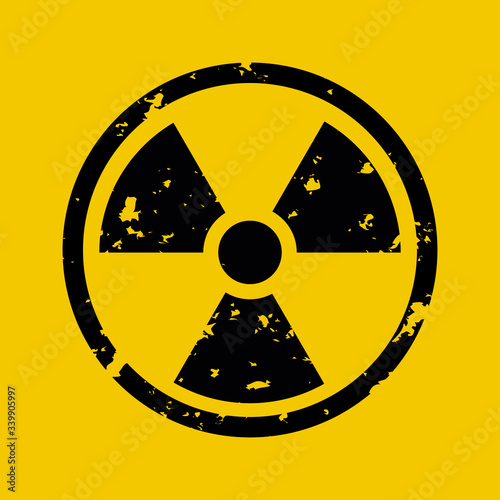 Vászonkép Vector illustration of grunge black radioactive hazard warning sign painted over