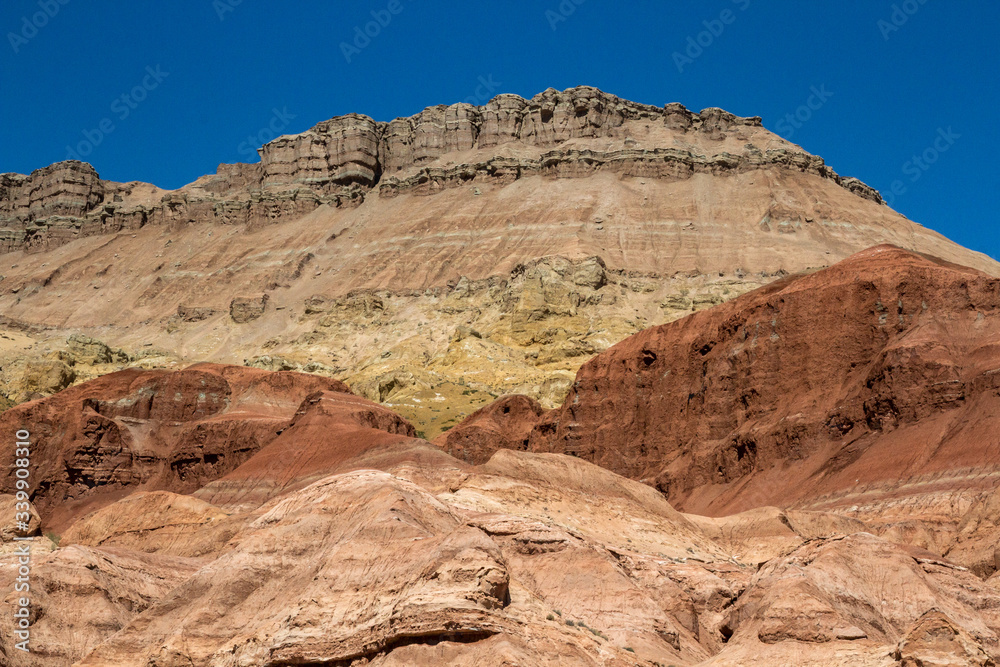 Colored, layered mountains of Aktau in the reserve of Kazakhstan.