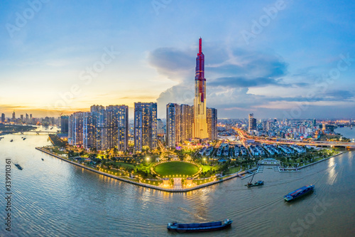 Fényképezés Top view aerial of center Ho Chi Minh City and Saigon bridge with development buildings, transportation, energy power infrastructure