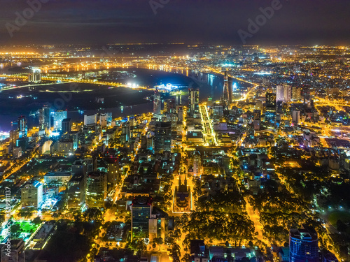 Top view aerial of Thu Thiem peninsula and center Ho Chi Minh City with development buildings, transportation, energy power infrastructure. Financial and business centers in developed Vietnam