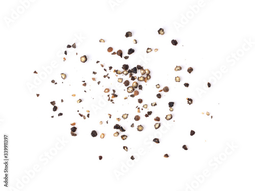 Ground black pepper on a white background top view