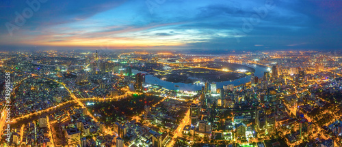 Top view aerial of Thu Thiem peninsula and center Ho Chi Minh City with development buildings, transportation, energy power infrastructure. Financial and business centers in developed Vietnam