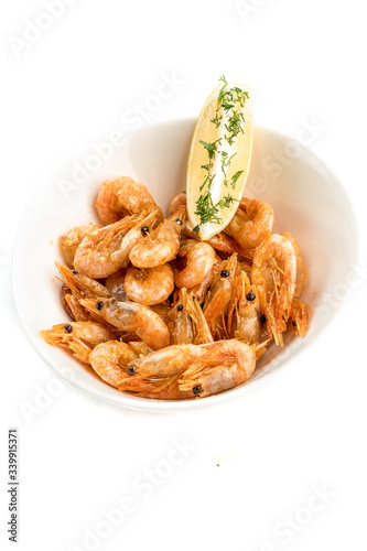 prawns with lemon on isolate white background 