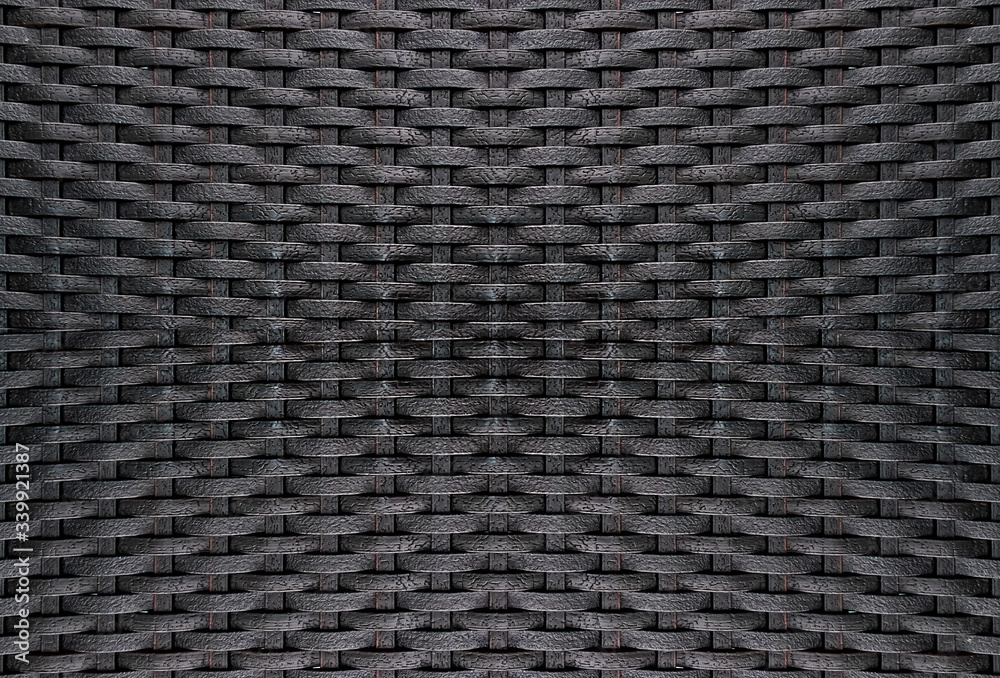 Black rattan weave texture background Black rattan weave texture background