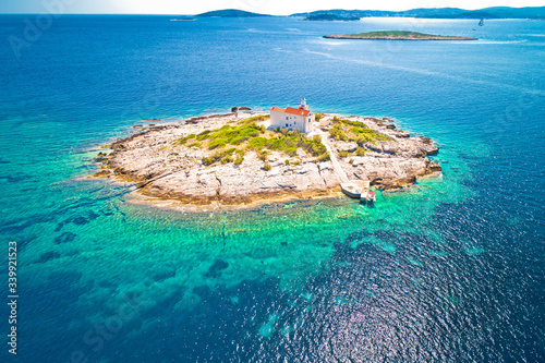 Aerial view of lonely island with lighthouse, island Vela Sestrica photo