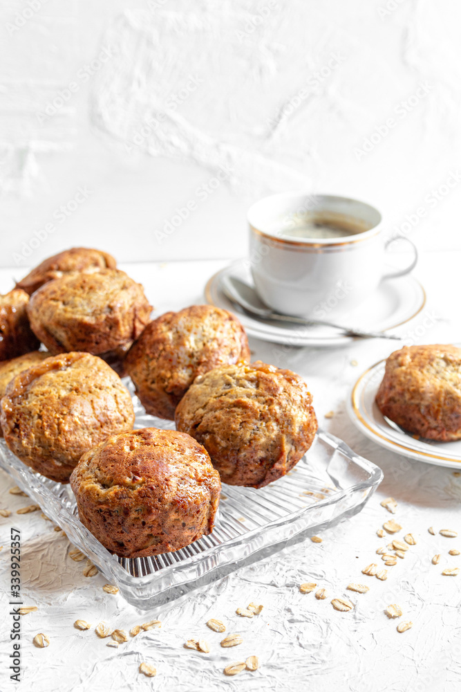 brown banana toffie muffins on a white background brown banana toffie muffins on a white background