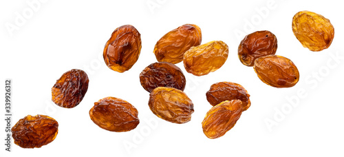 Raisins isolated on white background, close up photo