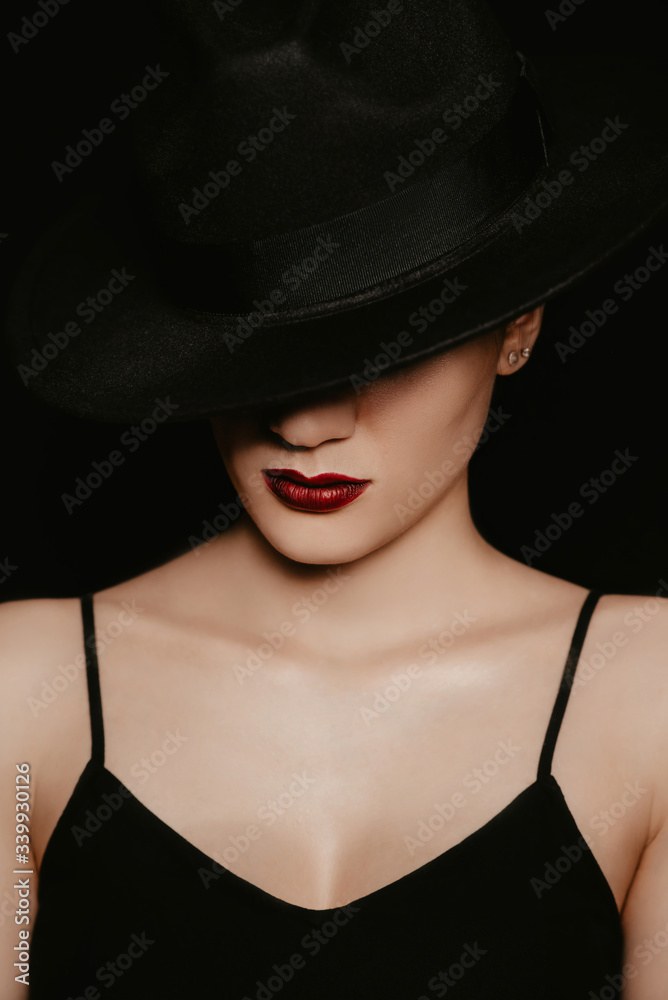 portrait of a beautiful girl in a black hat and dress portrait of a beautiful girl in a black hat and dress