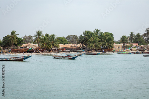 Pleople workingh at the beach in Barra, Gambia.