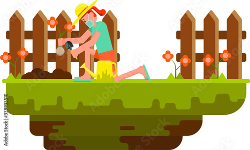 A woman taking care her flowers on garden