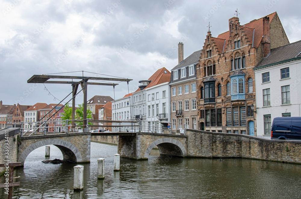 Drawbridge in Bruges, Belgium. Traditional bride over canal in Brugge.