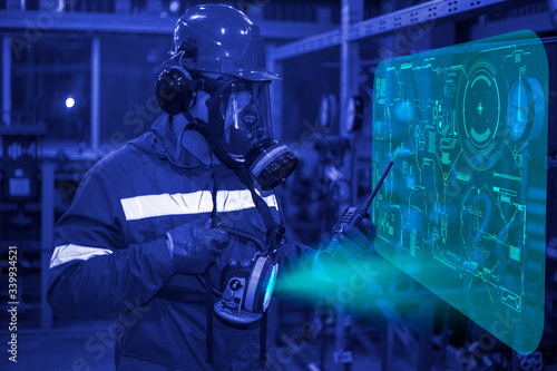 Oil  gas industry. Means of protection against harmful substances  control of the gas pollution of oil and gas equipment  the operator in a gas mask measures hazardous substances. Industrial Safety