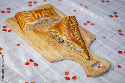 Delicious homemade pastry pie with various vegetables inside