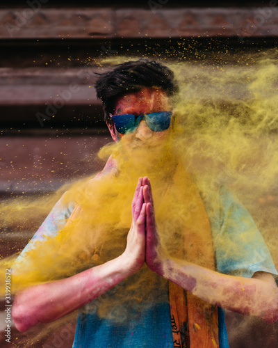 Portrait of man during Holi...
