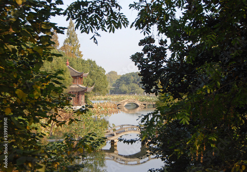 West Lake  Xi Hu  in Hangzhou  Zhejiang Province  China. View of Quyuan Garden  a scenic spot in Hangzhou on the edge of West Lake. West Lake is a major UNESCO tourist attraction in Hangzhou  China.