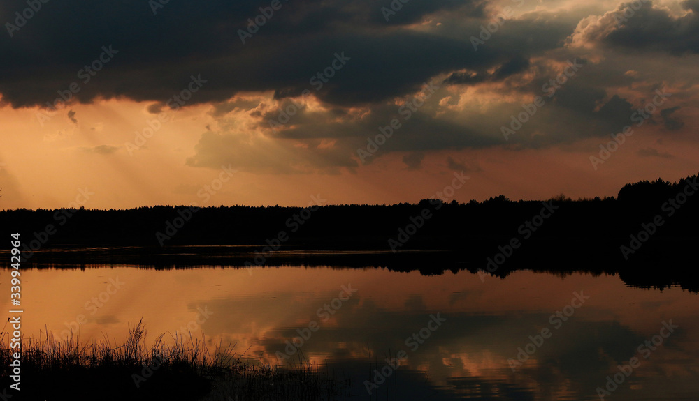 Mirror image of the setting sun