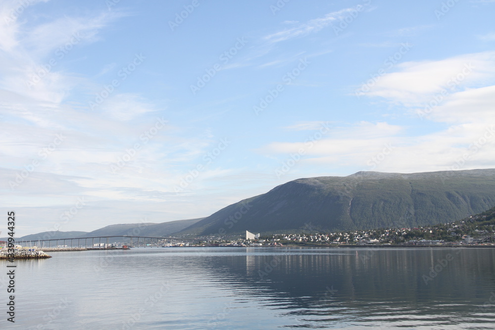 tromso tromsø  water travel tourism sea coast nature port blue landscape sky harbor architecture europe boatship mountain summer bay view city beautifull and mark mediterranean vacation town