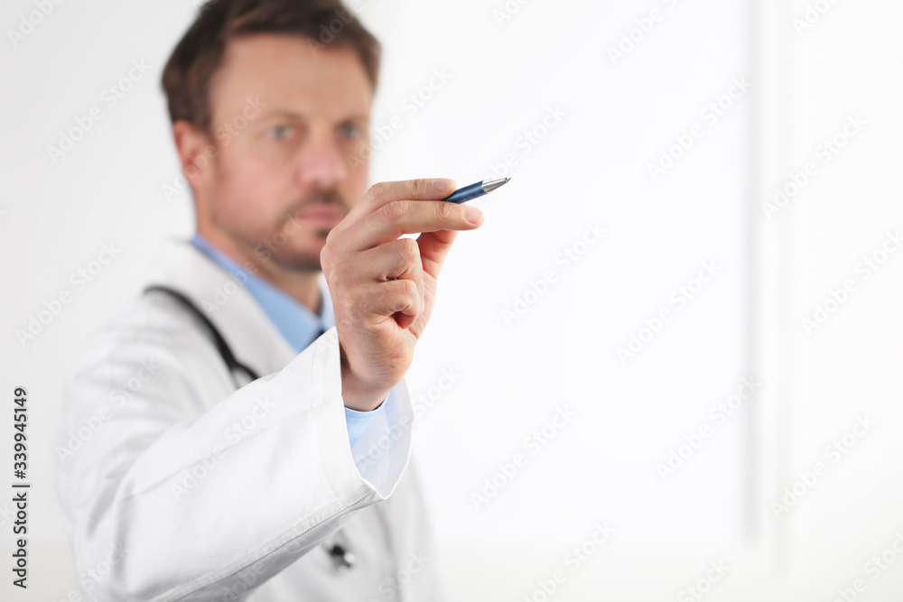 isolated doctor hand touch screen pointing with pen on white copy space background isolated doctor hand touch screen pointing with pen on white copy space background