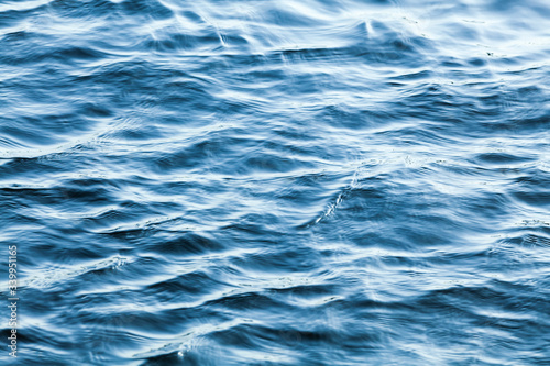 Wavy deep blue sea water surface, natural background