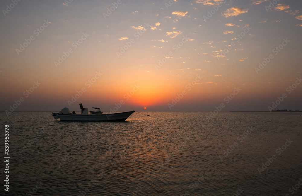 Speed boat and beautiful sunset, Bahrain