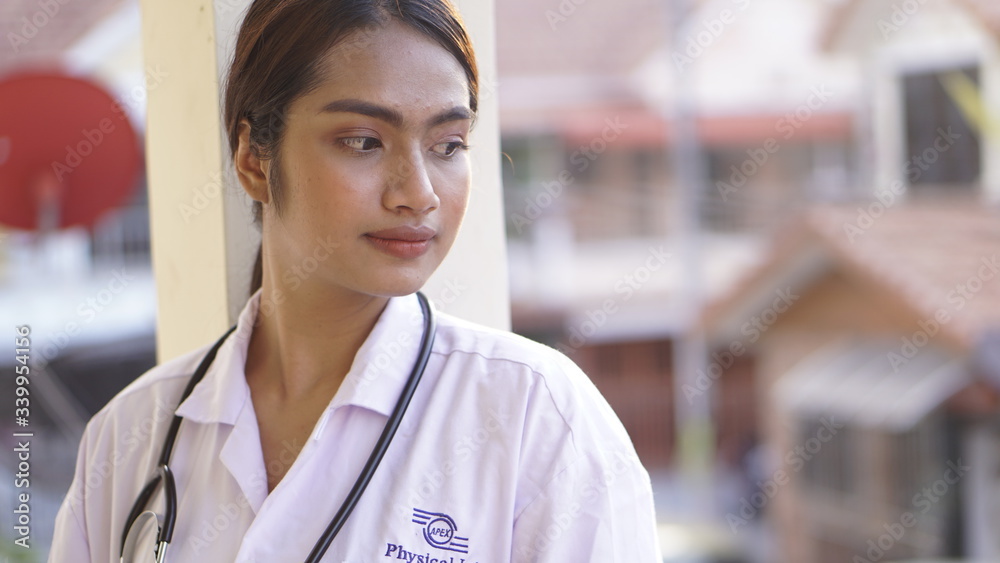 Fototapeta premium Medical physician doctor woman,Young of happy female smile face with stethoscope on blurred hospital background. 