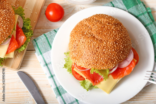 Fish burger on a plate vegan breakfast on white