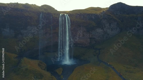 4K aerial footage of amazing waterfalls in South Iceland known as Seljalandsfoss Waterfall during summer season.