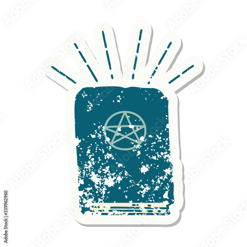 grunge sticker of tattoo style spellbook