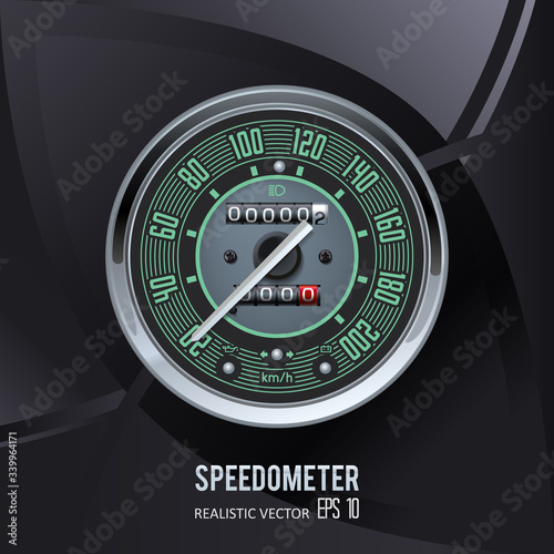 Retro motorcycle analog speedometer closeup.